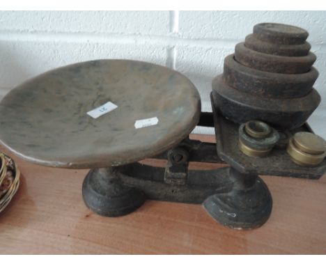 A set of vintage scales and weights