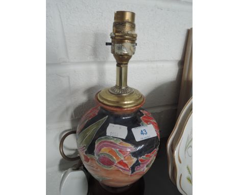 A Moorcroft style table lamp and shade