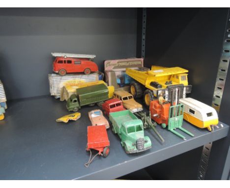 A selection of mixed die-casts including Dinky fire engine 955 boxed, Dinky 3 ton Army wagon 621 part boxed, Bedford tipper, 