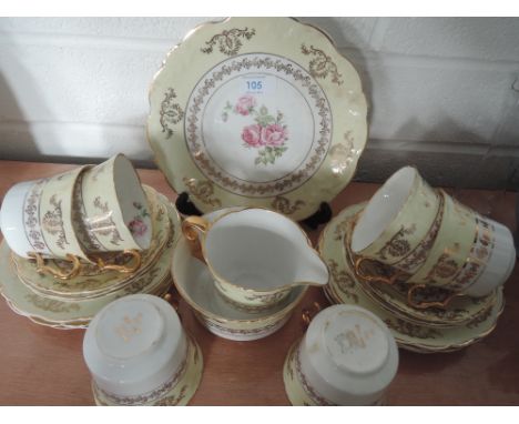 A Part Collingwood tea service in pale yellow and gilt, 21 pieces