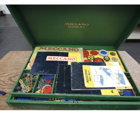 A vintage Meccano outfit No 9, part set with instructions, and in original green painted box
