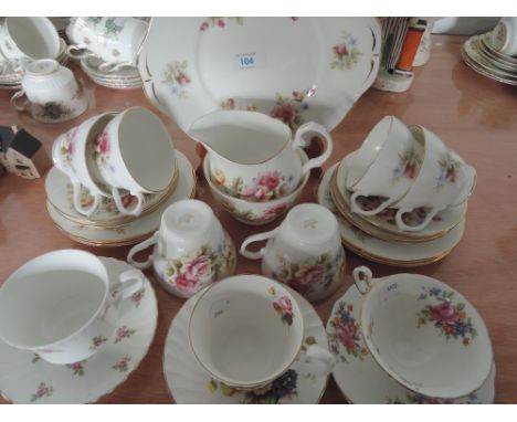 A Duchess part tea service white and gilt with floral decoration 21 pieces, also Royal Stafford, Royal Kendal  and Foley cup 