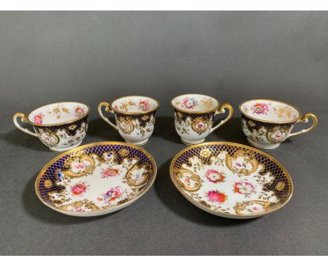 A selection of Spode - 2 tea cups, 2 coffee cups and 2 saucers in blue and gilt design with flower posies