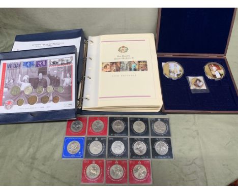 A folder containing 16 first day coin covers celebrating QE2 80th birthday, a first day coin cover of the 60th anniversary of