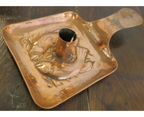 Newlyn copper taper stick, the square tray embossed with two fish, length 26cm, width 14cm