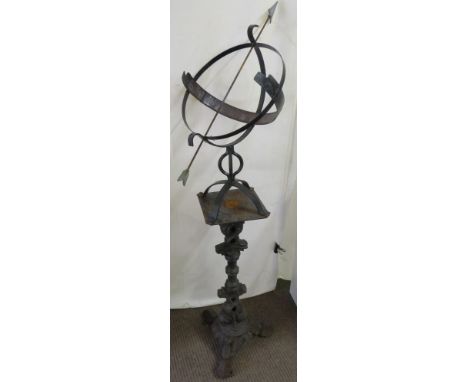 Armillary sundial on cast iron base with tripod foot, height 158cm, diameter of dial 39cm