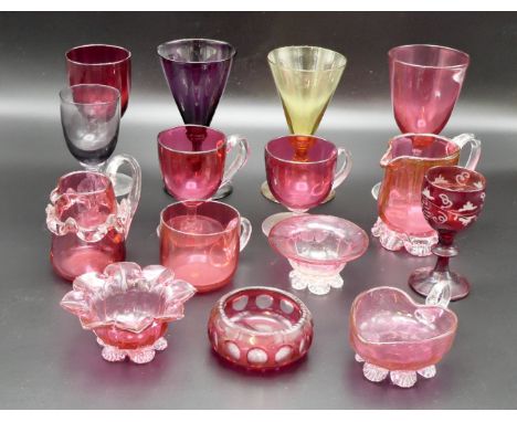 Nine items of Victorian and other cranberry glass including jugs, custards, posies, together with ruby etched liqueur glass a