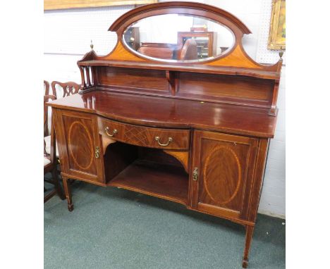 Regency style 19th century sideboard, mahogany with ebony and boxwood stringing, a central bow fronted door with geometric st