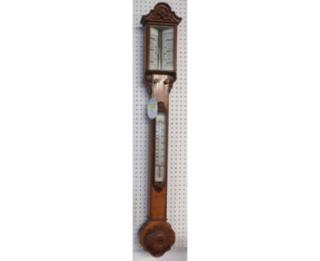 A carved oak 19th century mercury stick barometer with two settings (10am yesterday and 10am today), with rhyme markings 'ris