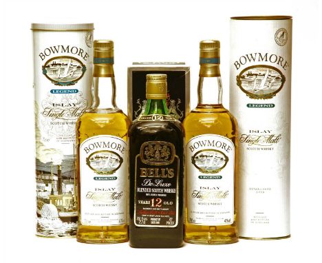 Assorted Whisky to include: Bowmore Legend Islay, two bottles (each in presentation tin) and Bell's De Luxe Blended Scotch Wh