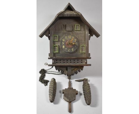 A Late 19th/Early 20th CEntury Black Forest Oak Cased Cuckoo Clock with Two Weights, 33cm high 