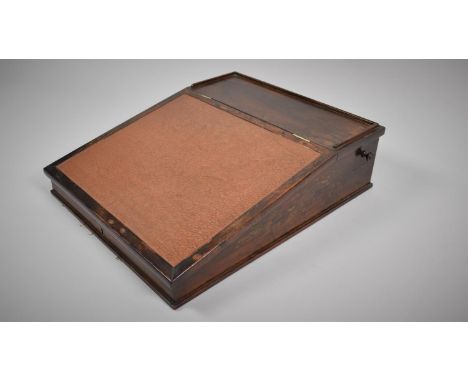 A 19th Century Rosewood Table Top Clerk's Desk with a Galleried Back, Leatherette Writing Surface and one Side Drawer, 15x51x