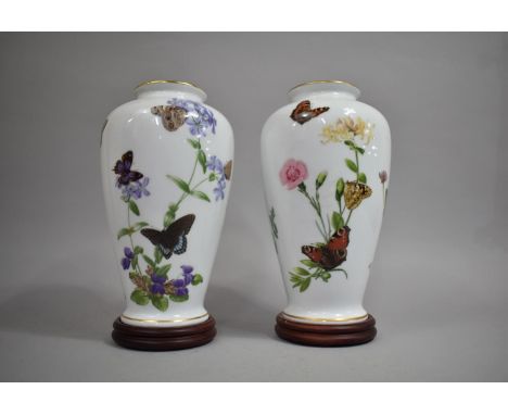A Pair of Franklin Porcelain Butterfly Vases by John Wilkinson on Turned Wooden Stands, 29cm high 