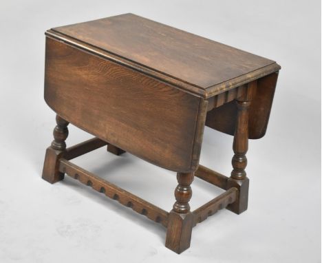 A Mid 20th Century Small Drop Leaf Oak Occasional/Coffee Table, 20cm 51cm wide 