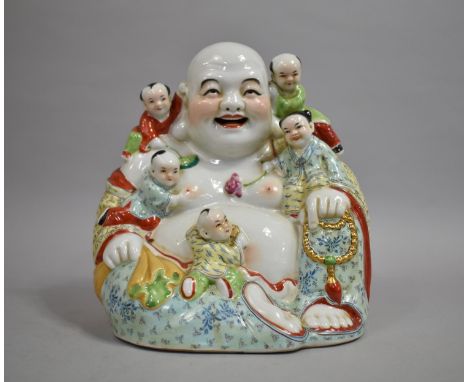 A Large Chinese 20th Century Ceramic Seated Smiling Buddha with Five Children in Polychrome Enamels, 27cm high 