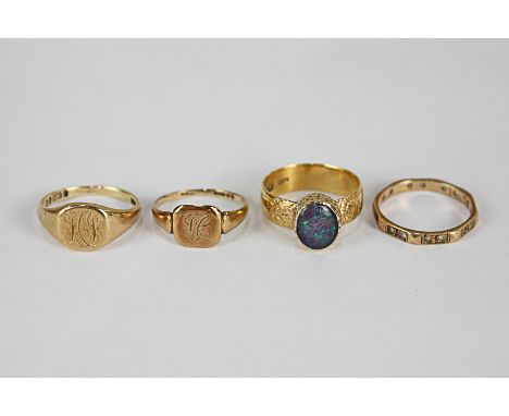 A 22ct gold ring, now with an opal mount, two 9ct gold signet rings with engraved initials and a 9ct gold eternity ring (a/f 