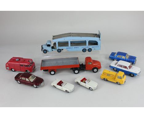 A collection of Dinky Toys die-cast model motor vehicles, to include a Bedford Pullmore Car Transporter, a Fire Engine and an