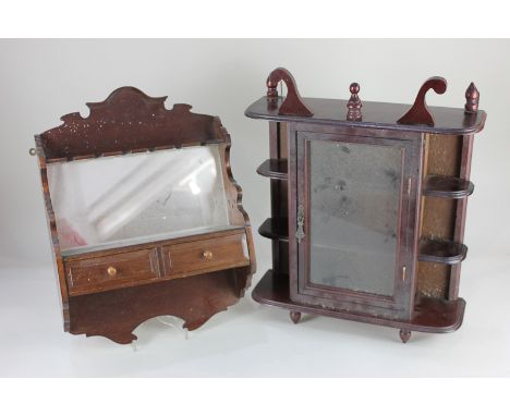 A mahogany collectors wall unit, the glass panel door enclosing three shelves, with three corner shelves to each side, togeth