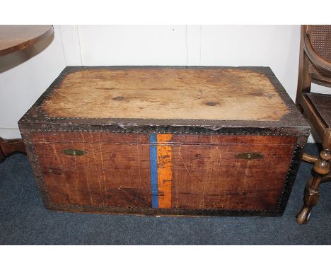 A Lovelaces patent zinc lined rectangular travel trunk with metal mounted exterior and carry handles, 101cm