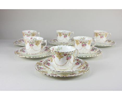 A Victorian Aynsley porcelain part tea set for six, of scalloped form with floral decoration, comprising six teacups, saucers