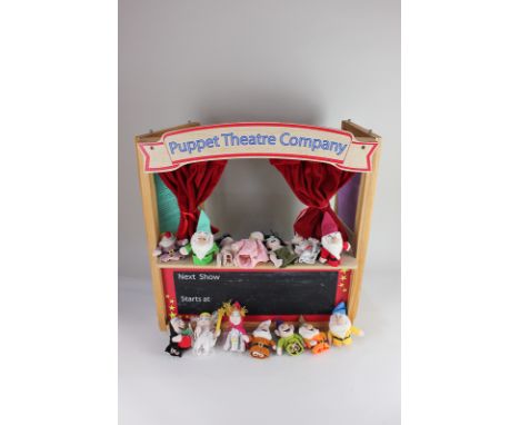 An ELC puppet theatre, with finger puppets and story cards for Cinderella and Snow White