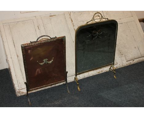 A planished copper fire screen, with wrought iron handle and legs, and brass swag to centre, 65cm high, together with a brass