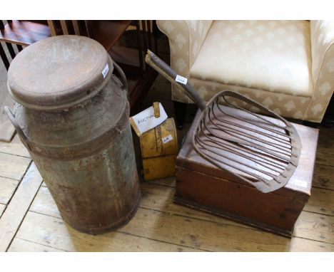 A vintage milk churn, a railway lamp, a shovel and a box of tools