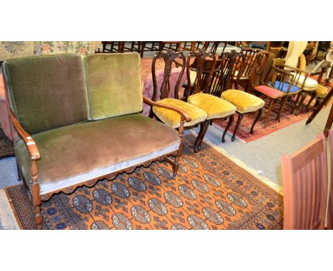 Carved mahogany framed two seater sofa with canework back and stuffed over cushion; together with a set of three mahogany din