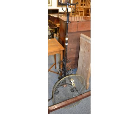 Wrought iron oil lamp stand and 19th century spark guard