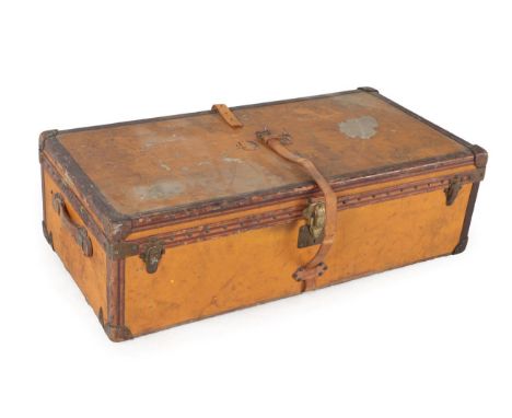 An Early 20th Century Louis Vuitton Brown and Close-Nailed Leather Trunk, with brass strapwork and hinges, the silk-lined int