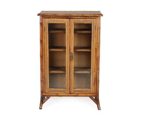 A Victorian Bamboo Display Cabinet, late 19th century, labelled W Boyes &amp; Co Ltd, Drapers and House Furnisher, Queen Stre