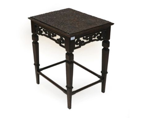 A Chinese Hardwood Occasional Table, late 19th/early 20th century, of rectangular form, the top carved in relief with five ci