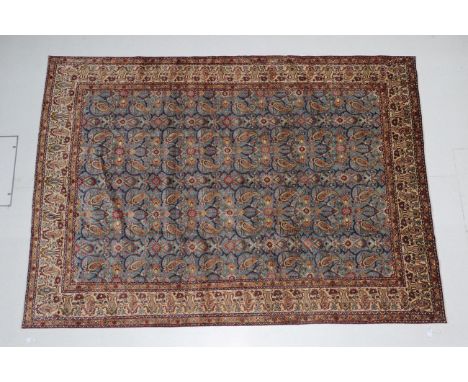 Good Tabriz Carpet North West Iran, circa 1950 The powder blue field with an allover lattice design of boteh and flowerheads 