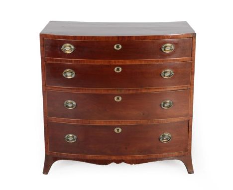 A George III Mahogany, Crossbanded and Boxwood Strung Bowfront Chest of Drawers, late 18th century, the four graduated drawer