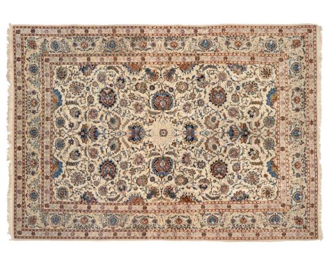 Kashan Carpet  Central Iran, circa 1950 The cream ground with an all over design of large palmettes and flowerhead between vi