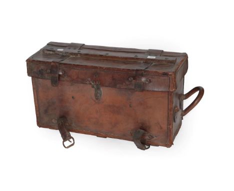 An Early 20th Century Military Leather Mule/Ammunition Chest, the hinged lid strengthened by a wooden baton, with leather str