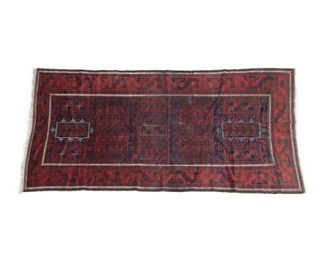 Timuri/Balouch Carpet West Afghanistan, circa 1910 The indigo field with columns of panels enclosed by borders of angular ser