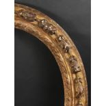 An 18th Century Carved Oval Frame, 22" x 18.75" - 56cm x 47.5cm. (Rebate Size)