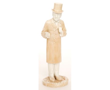 A late 19th Century figure of a gentleman dressed in a long over coat and top hat, wearing a monocle, with one hand open and 