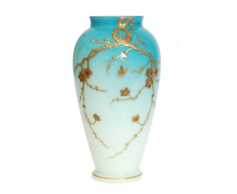 A late 19th Century Harrach Peachblow glass vase of footed high shouldered form, relief paste gilt with flowering boughs and 