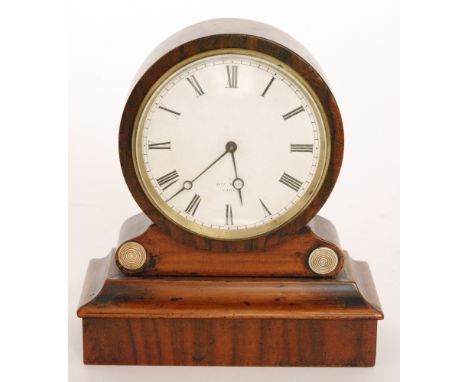A small 19th circular mahogany cased mantle clock by Henry Marc Paris on plinth base, height 17cm 