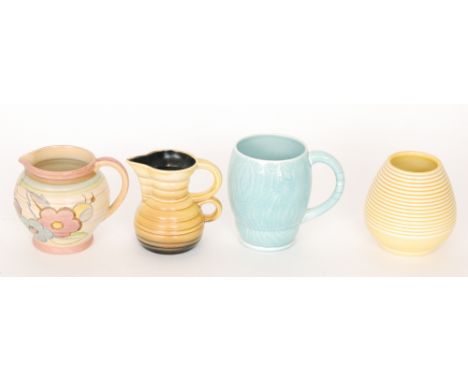 Four pieces of assorted Carlton Ware comprising a yellow glazed 'Engine Turned' ware vase, a blue glazed mug with abstract li