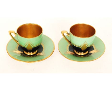 Two 1930s Art Deco Carlton Ware Melon shape coffee cups and saucers decorated in the Diamond pattern with green and black ban