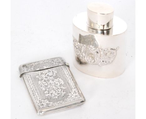 A hallmarked silver rectangular card case with engraved foliate decoration, with an oval tea caddy, Birmingham 1908 and Londo