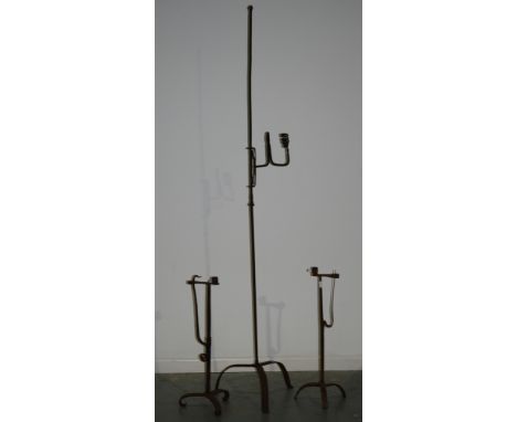AMENDED DESCRIPTION - An 18th Century style iron floorstanding rush light holder on splayed tripod legs, height 174cm, a pair