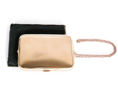 A George V hallmarked 9ct combined cigarette case and compact of plain cushioned rectangular outline, the push button release