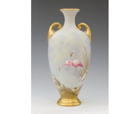 A Royal Worcester twin handled shape H287 vase decorated by George Johnson with hand painted flamingo stood in a rocky wateri