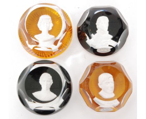 A group of four 20th Century Baccarat glass paperweights each with a central sulphide portrait, comprising The Prince of Wale