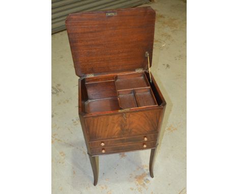 A 19th Century inlaid mahogany work table with crossbanded canted top over two drawers on splayed slender legs, width 42cm