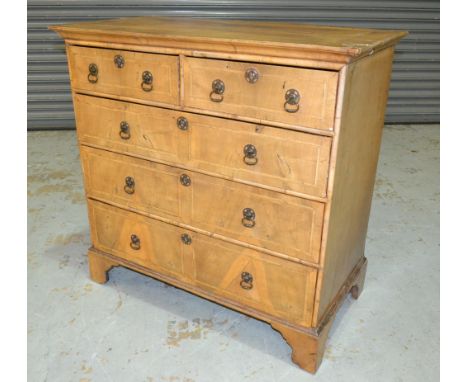 A Georgian walnut cross-banded chest of two short over three long drawers, raised to bracket feet, width 99cm, S/D.